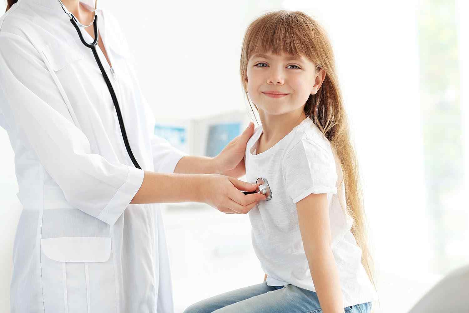 doctor check a child
