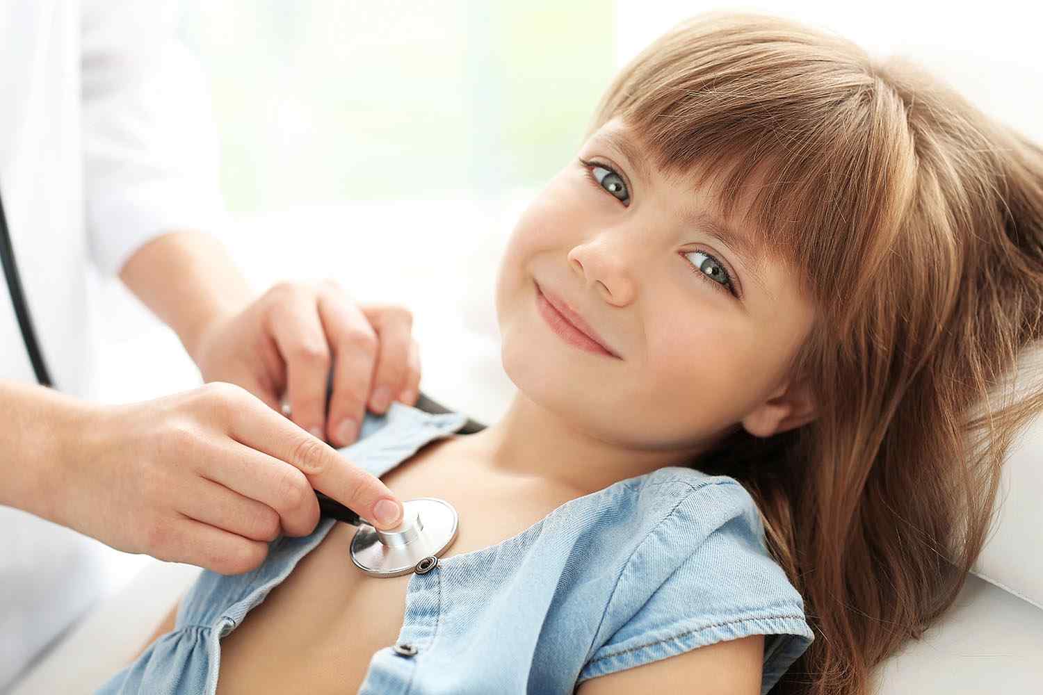 doctor check a child